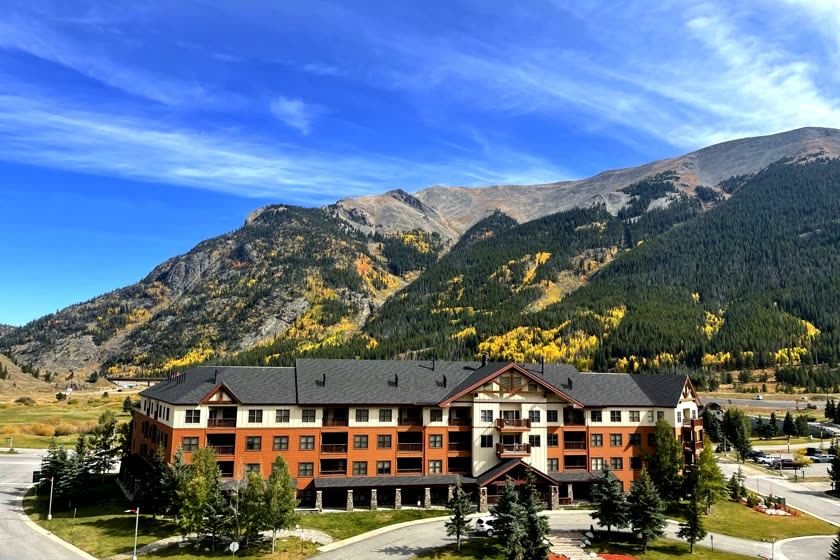 Copper Springs Lodge with the mountain behind it