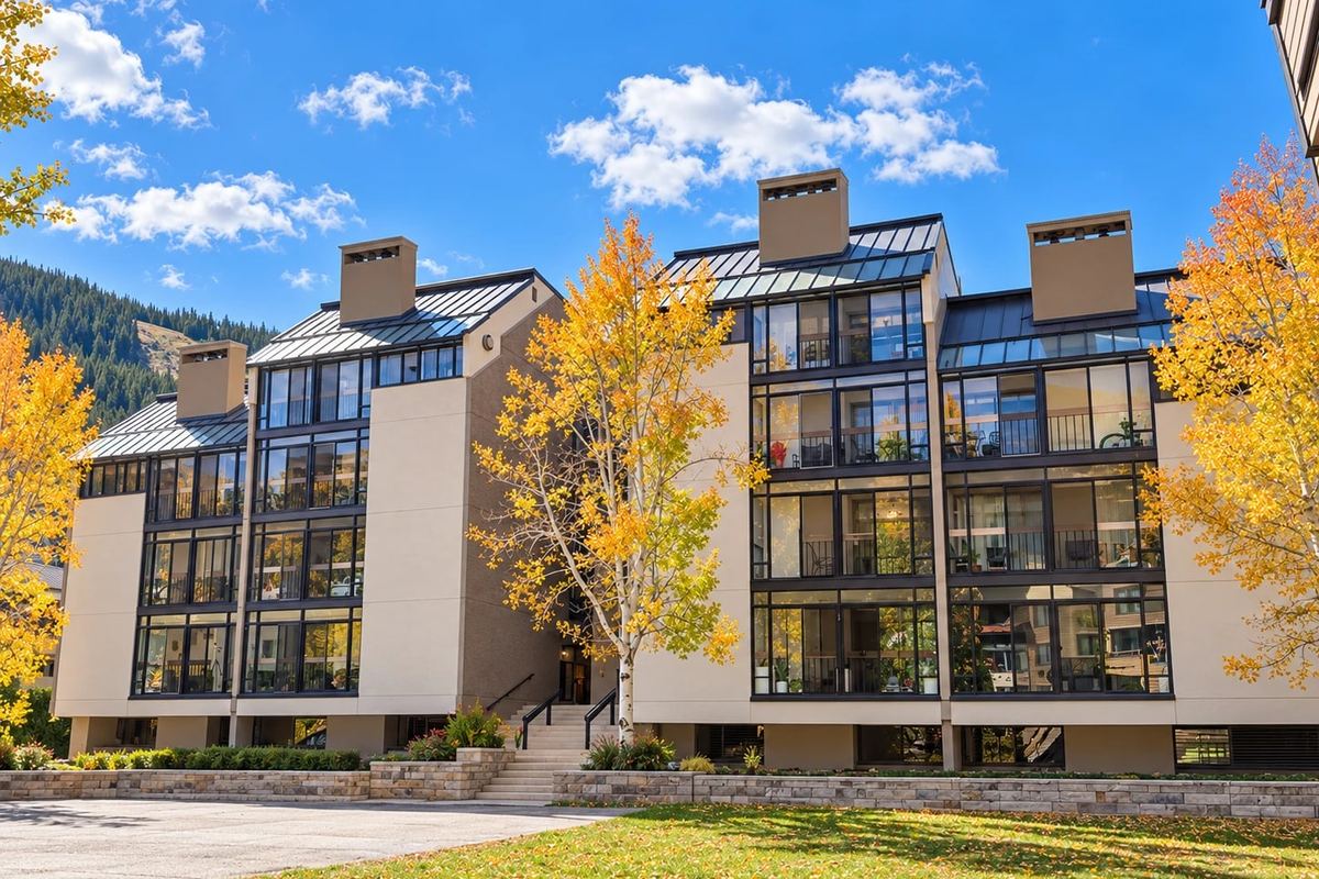 Wheeler House condominiums with fall aspens in front